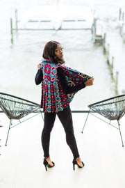 Women's African jacket with  pleated tail.